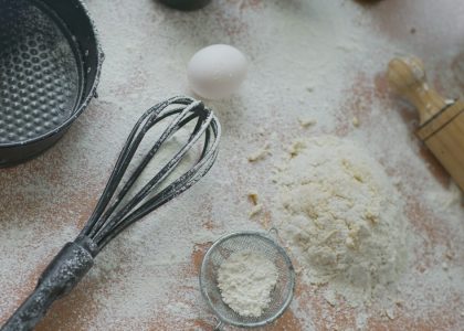 Baking ingredients are prepared on a floured surface